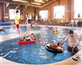 Relax in the swimming pool at Windsor Caravan; Driffield